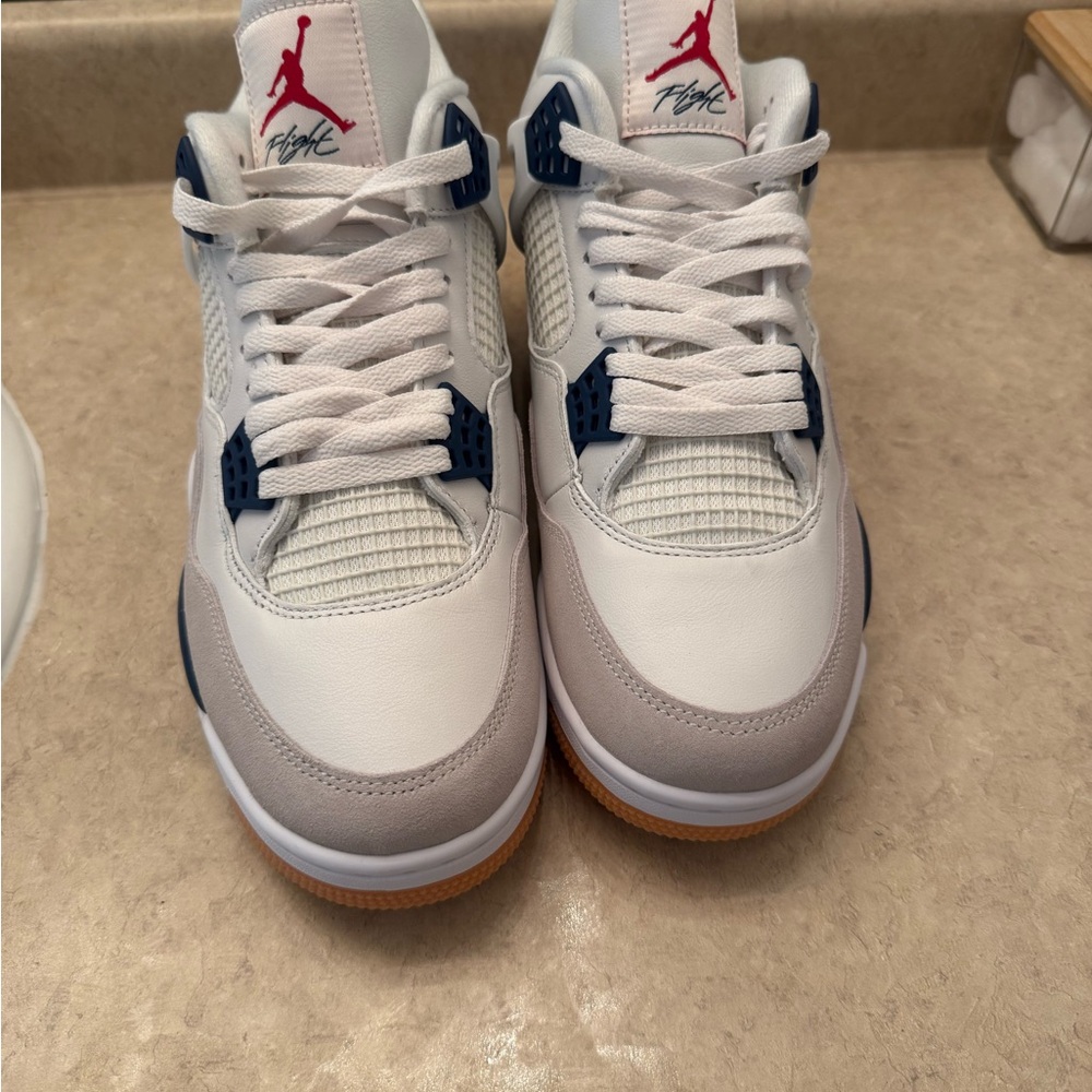 Air Jordan 4 Retro White Sneakers